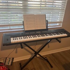 Yamaha Black Electronic Keyboard with Stand